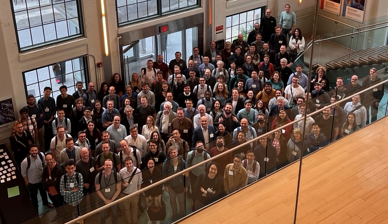 A photo of 140 attendees.